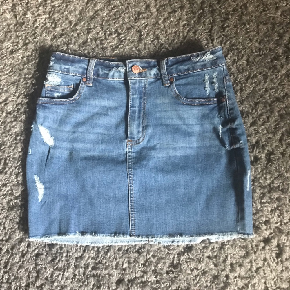 Distress denim mini skirt in size M
